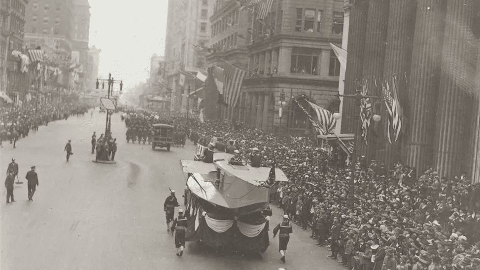 Black and white historical photo showing a street scene in Philadelphia.